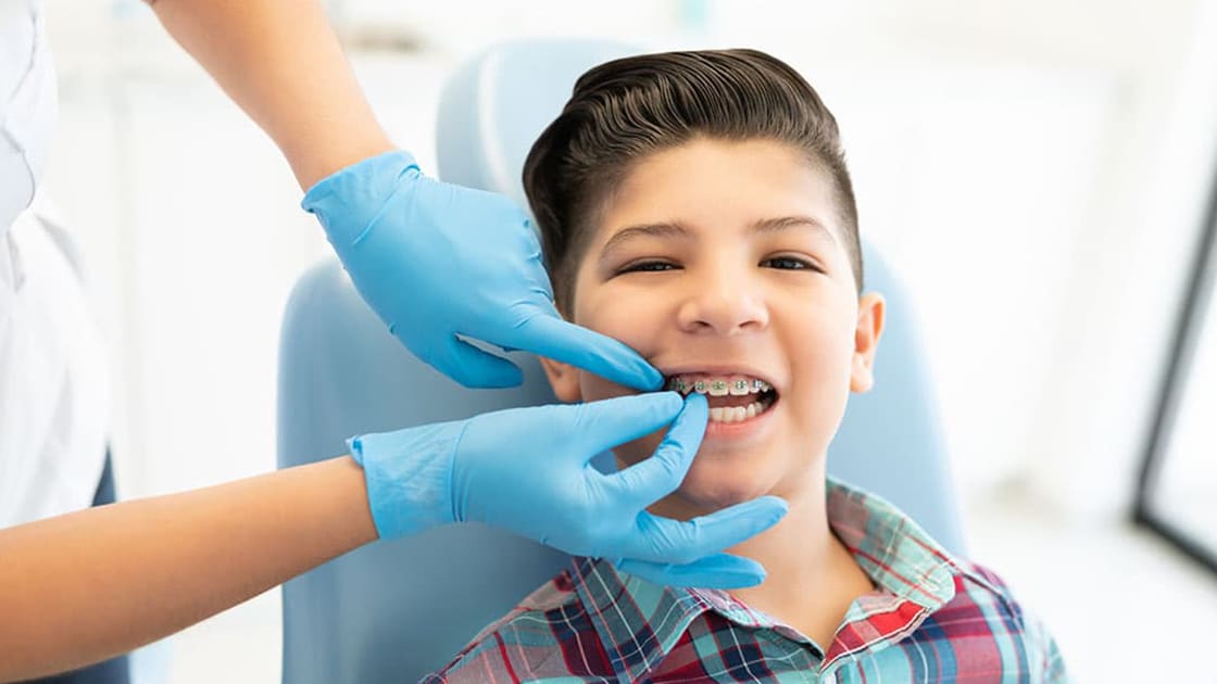 Boy with Braces Getting an Adjustment